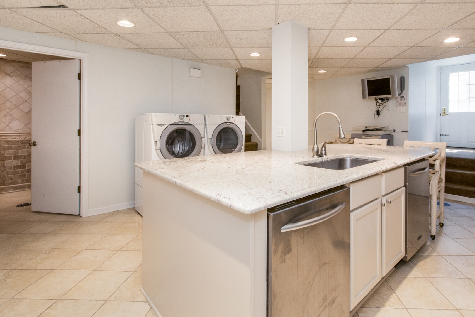 201 Scottswood Road Riverside, IL 60546 - Photo 66 of 75 a utility room with sink dryer and washer