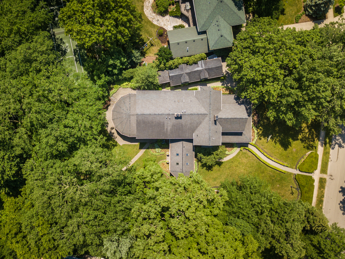 201 Scottswood Road Riverside, IL 60546 - Photo 70 of 75 an aerial view of a house with a yard and large trees