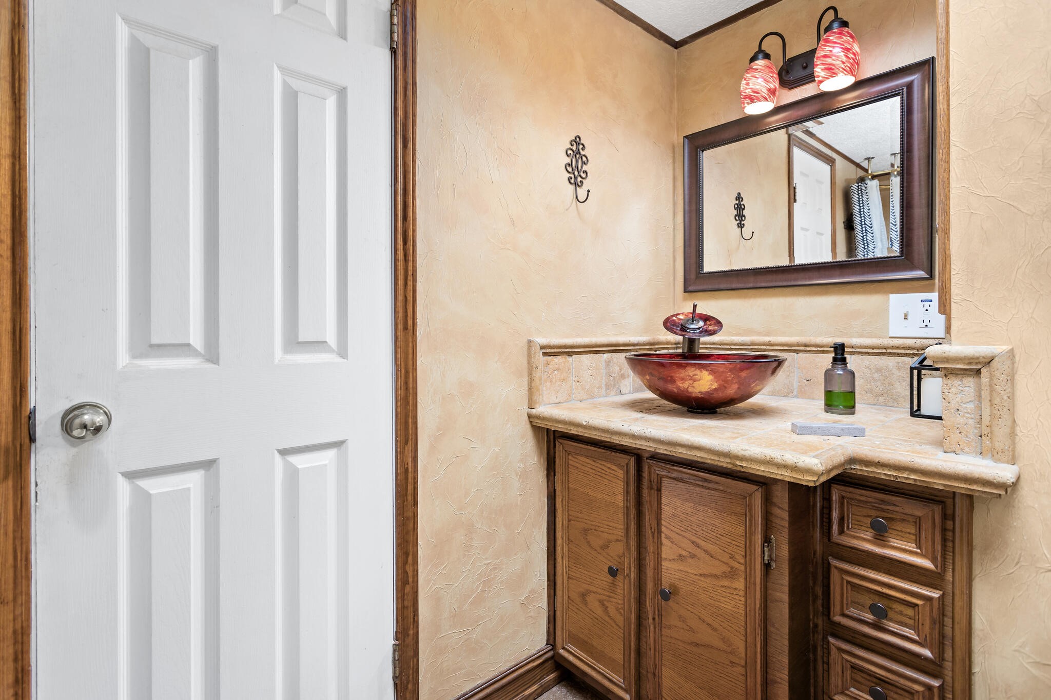 134 Sherwood Trail Silsbee, TX 77656 - Photo 25 of 41 a bathroom with a sink a mirror and a window