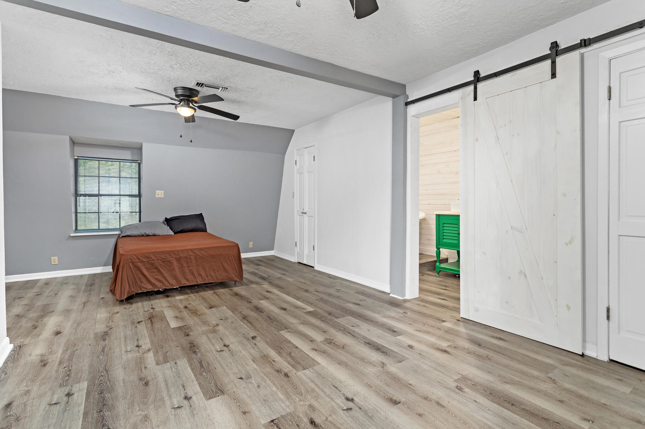 134 Sherwood Trail Silsbee, TX 77656 - Photo 29 of 41 a bedroom with a bed and window