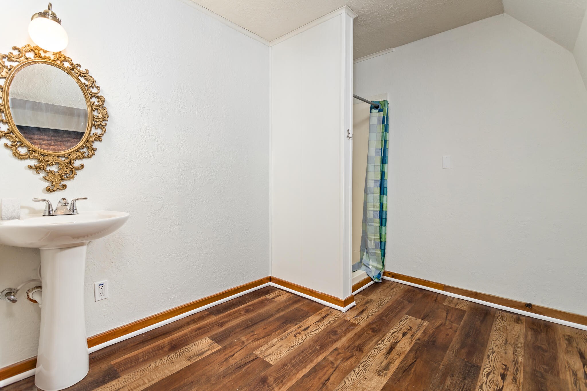 134 Sherwood Trail Silsbee, TX 77656 - Photo 32 of 41 a view of a room with wooden floor and bathroom sink