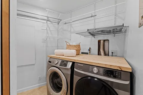 a utility room with dryer and washer