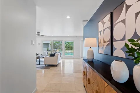 a living room with furniture and window