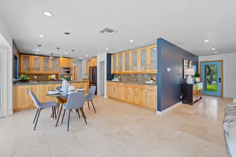 a view of a dining room with furniture