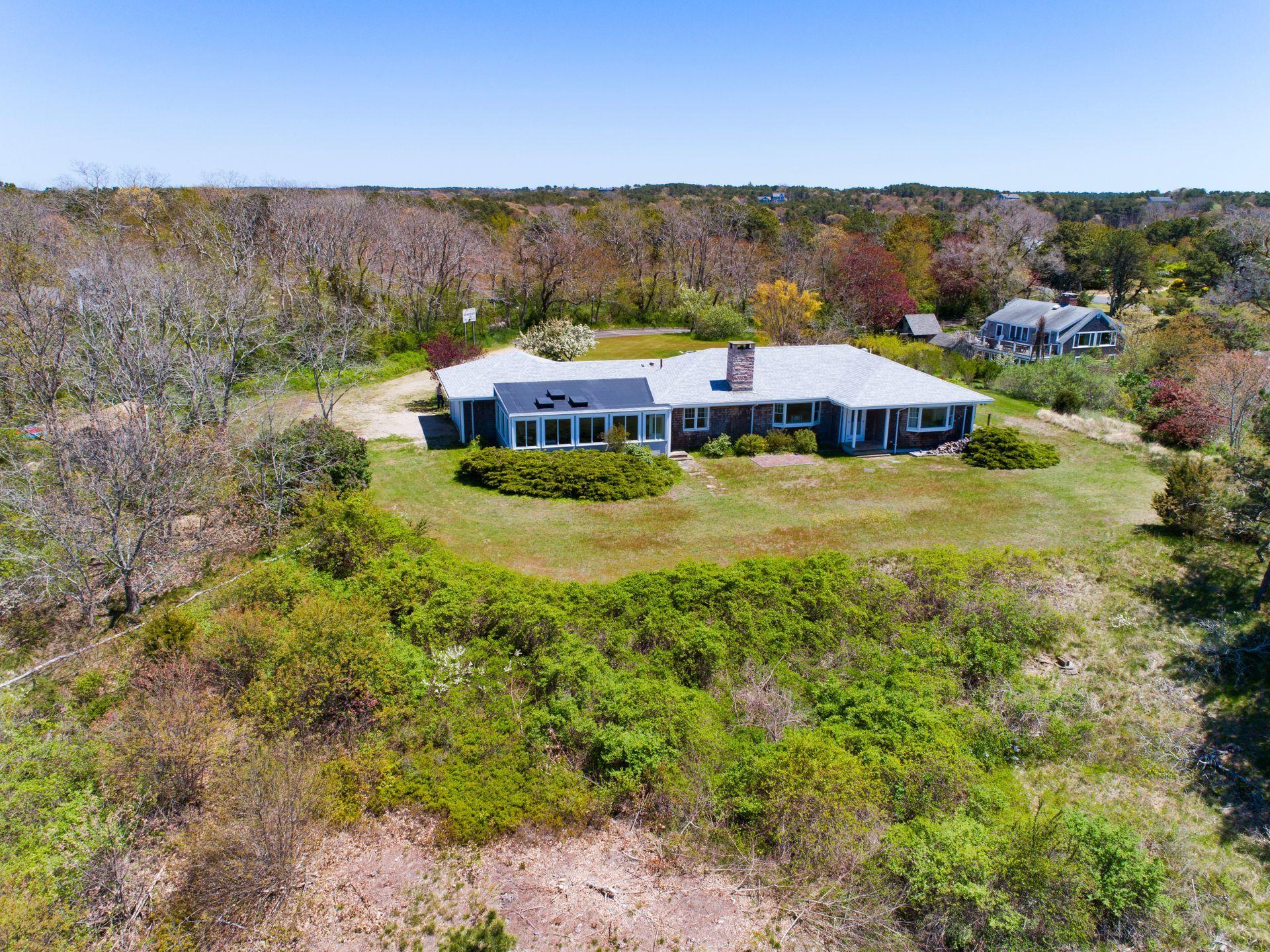 63 Depot Road Truro, MA 02666 - Photo 3 of 36 a view of house with yard and outdoor seating