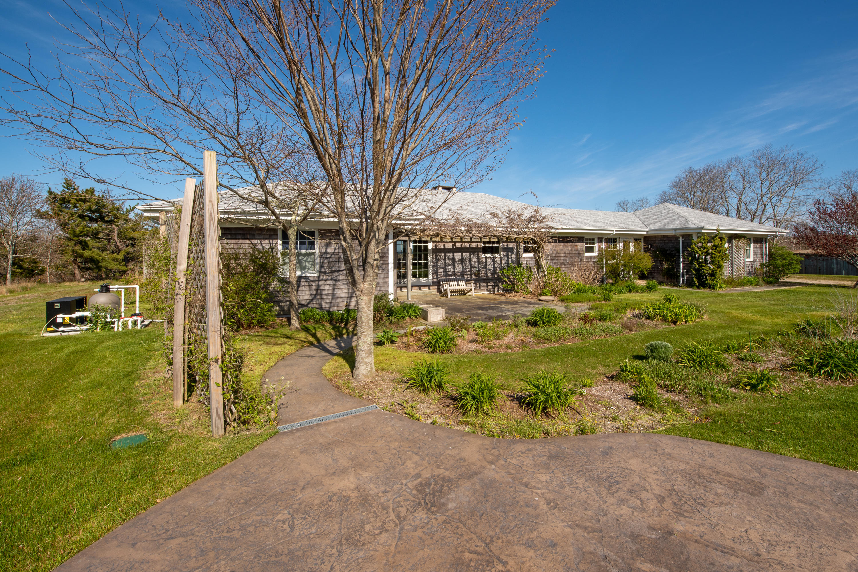 63 Depot Road Truro, MA 02666 - Photo 32 of 36 a view of a yard with plants and trees