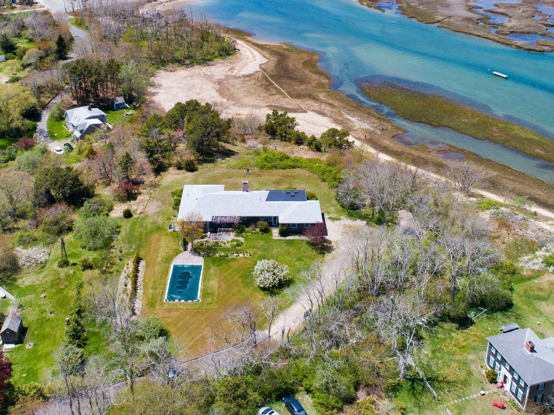 63 Depot Road Truro, MA 02666 - Photo 5 of 36 an aerial view of a house with a yard