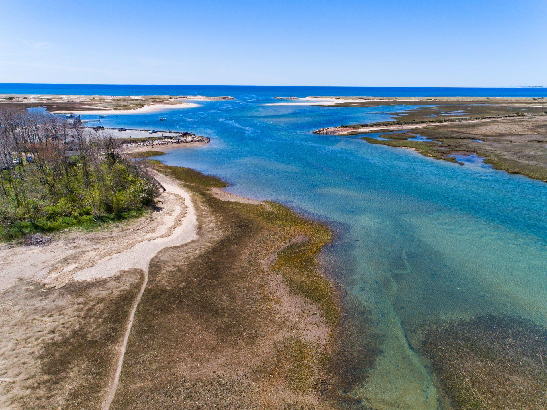 63 Depot Road Truro, MA 02666 - Photo 6 of 36 a view of an ocean and beach