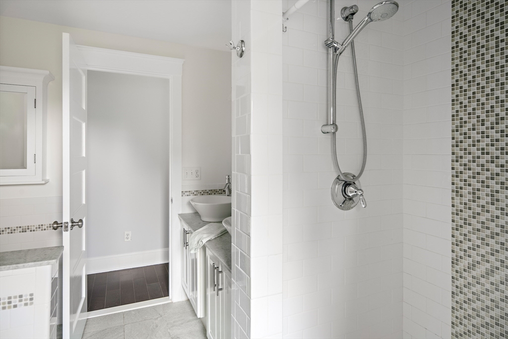 60 Rosemary Street Needham, MA 02494 - Photo 13 of 29 a bathroom with a shower