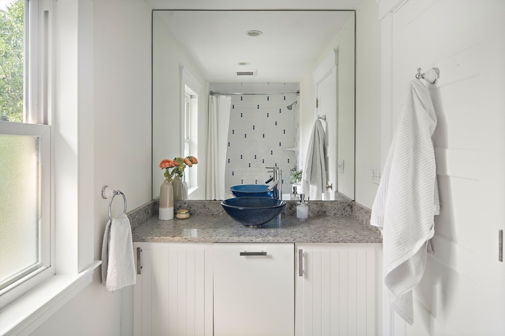 60 Rosemary Street Needham, MA 02494 - Photo 18 of 29 a kitchen with granite countertop a sink and a granite counter top