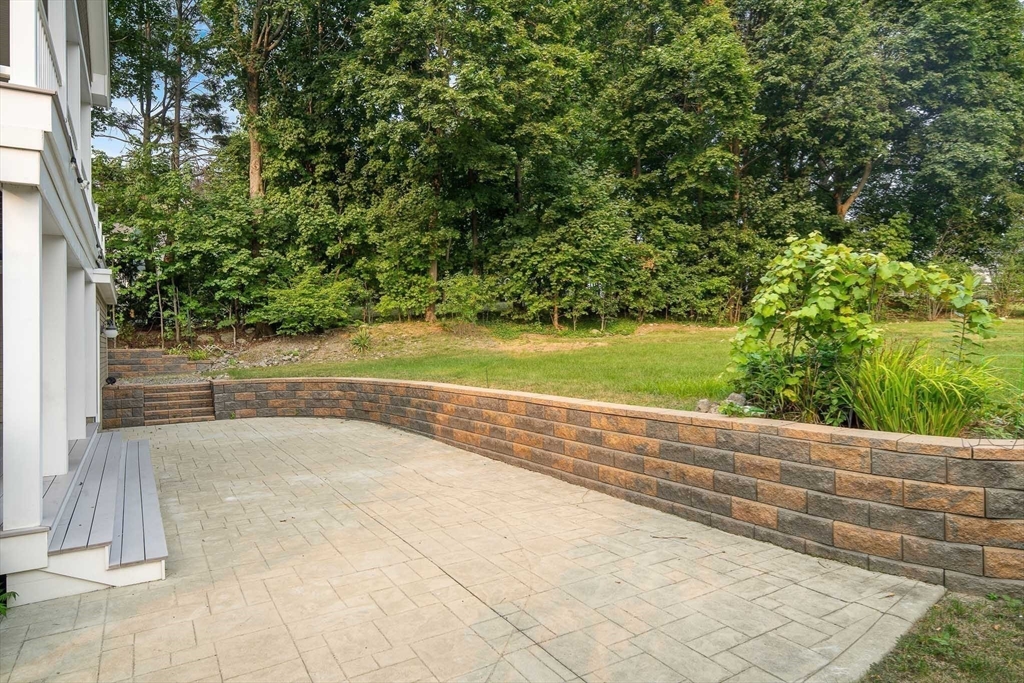 60 Rosemary Street Needham, MA 02494 - Photo 28 of 29 a view of a yard with an outdoor space