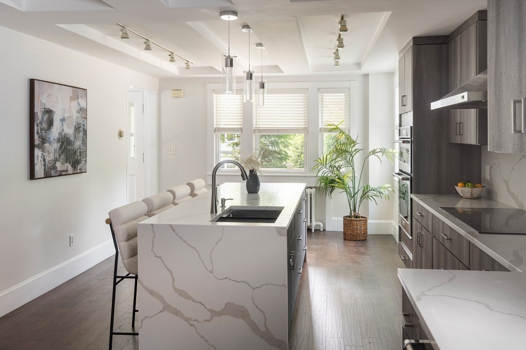 60 Rosemary Street Needham, MA 02494 - Photo 4 of 29 a view of a kitchen and dining room