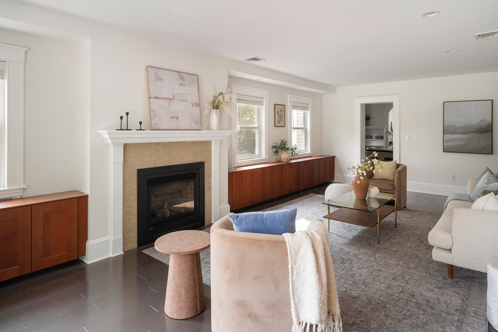 60 Rosemary Street Needham, MA 02494 - Photo 6 of 29 a living room with furniture and a fireplace