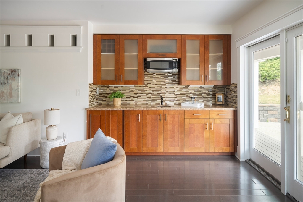 60 Rosemary Street Needham, MA 02494 - Photo 8 of 29 a living room with furniture and a large window