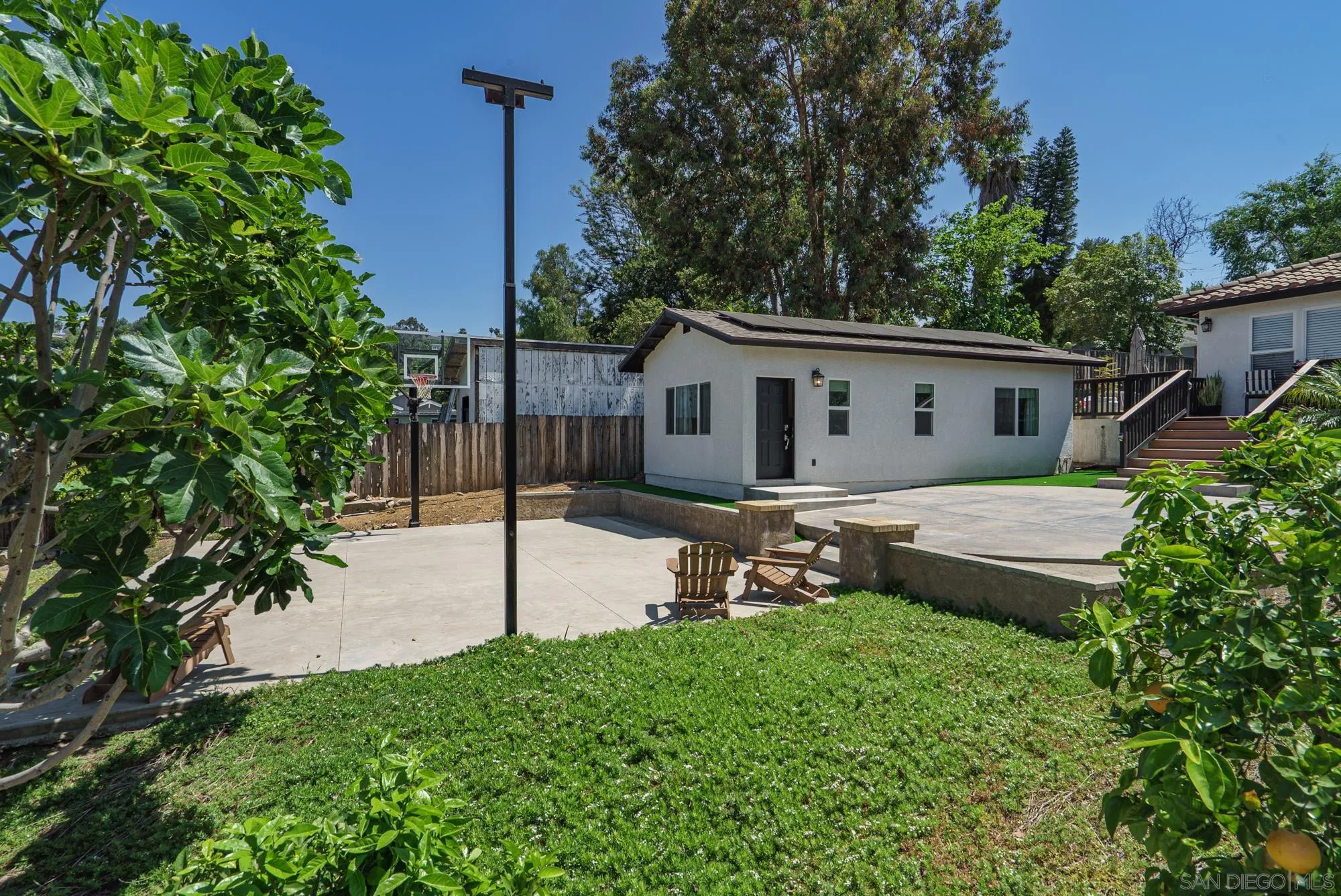 Sierra Madre Rd Spring Valley Spring Valley, CA 91977 - Photo 15 of 19 a view of a house with backyard and sitting area