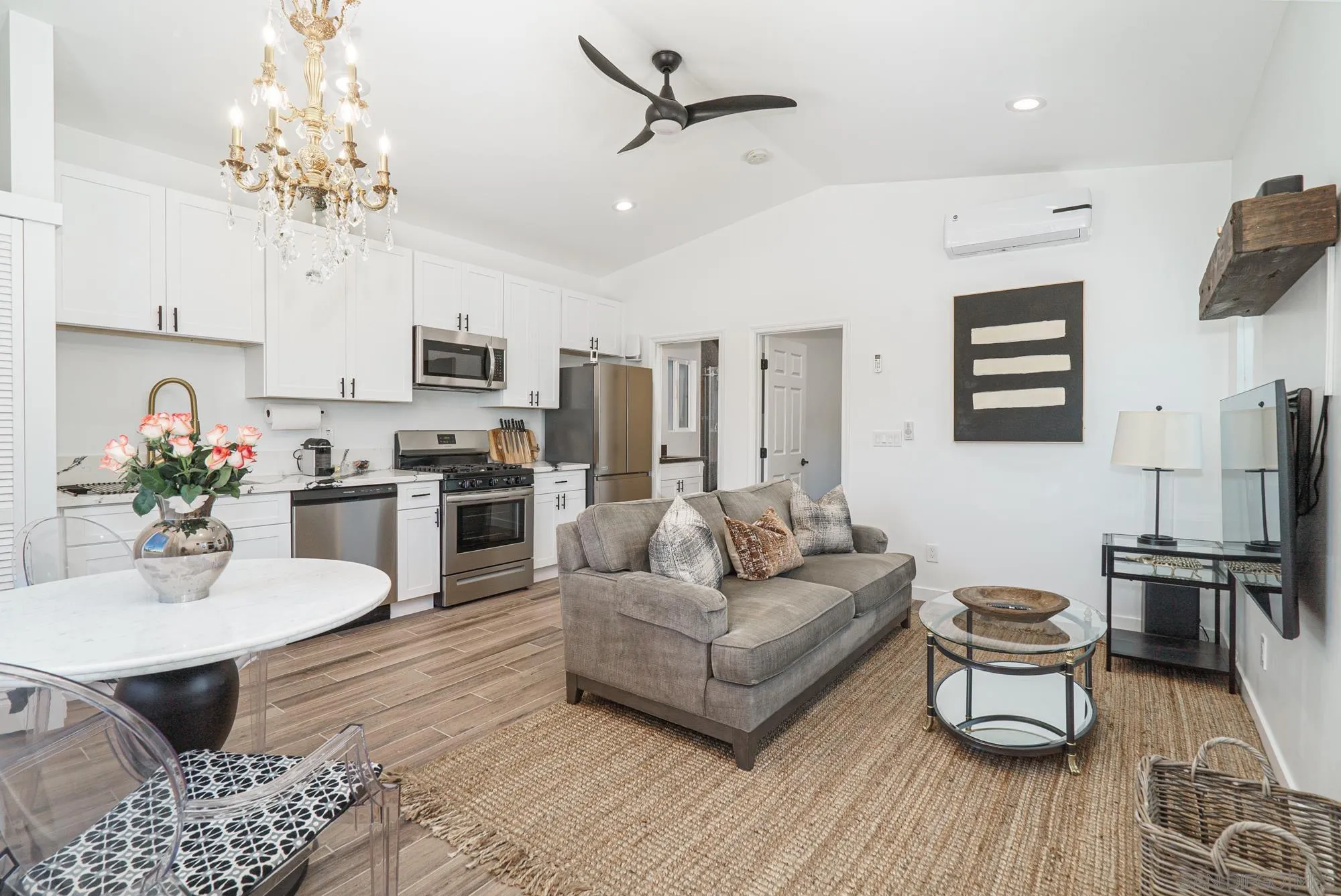 Sierra Madre Rd Spring Valley Spring Valley, CA 91977 - Photo 2 of 19 a living room with stainless steel appliances furniture and a kitchen view