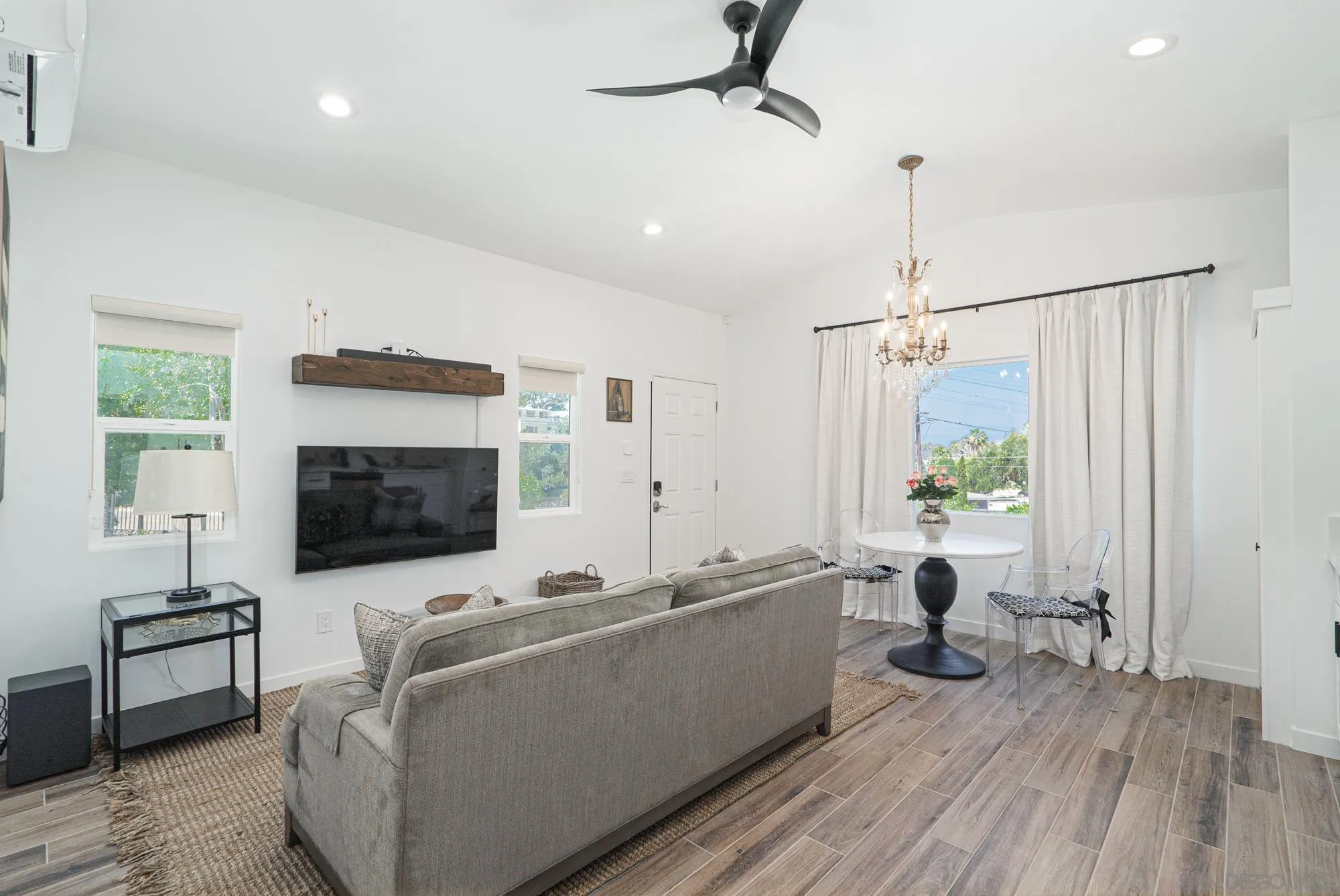 Sierra Madre Rd Spring Valley Spring Valley, CA 91977 - Photo 3 of 19 a living room with furniture and a flat screen tv