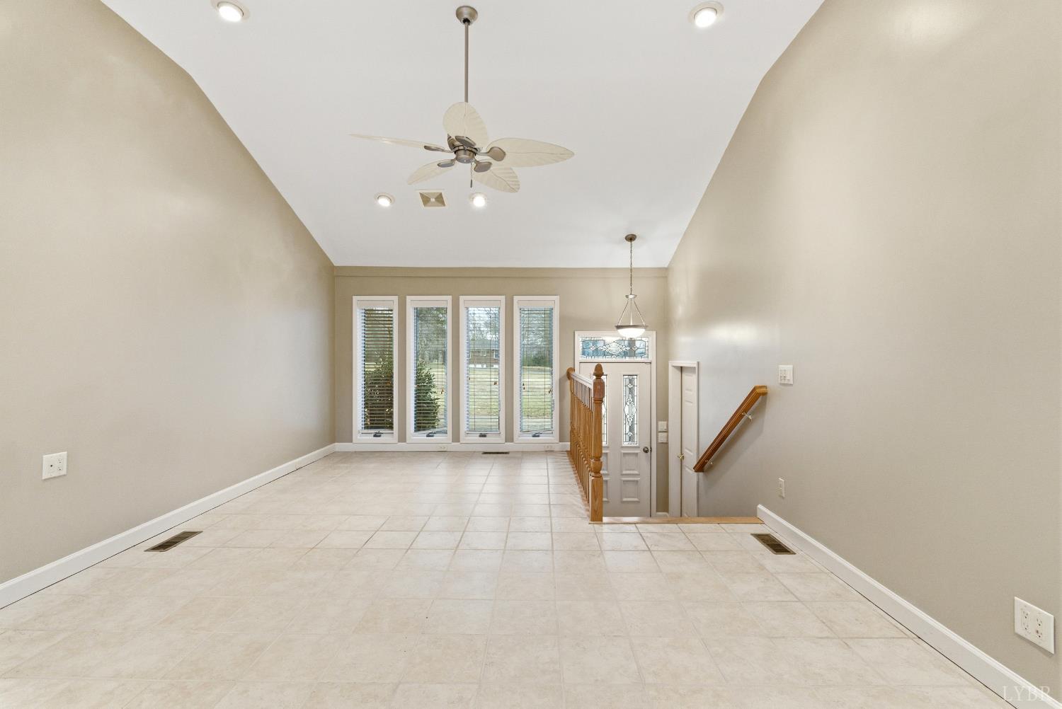 7092 Stage Coach Road Nathalie, VA 24577 - Photo 19 of 57 a view of a livingroom with a ceiling fan and window
