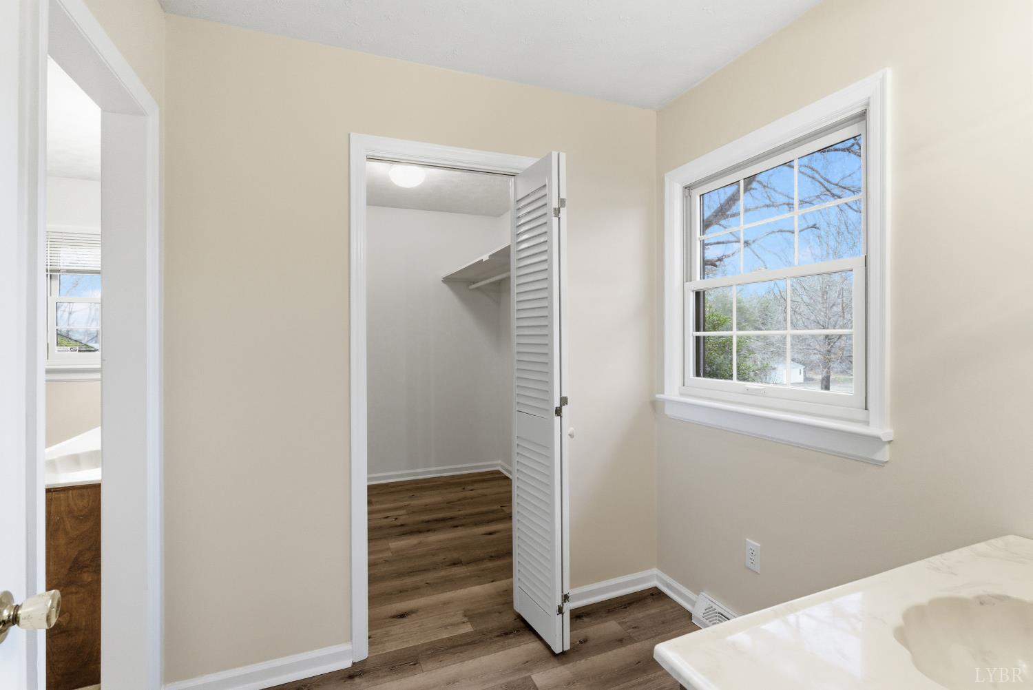 7092 Stage Coach Road Nathalie, VA 24577 - Photo 26 of 57 a bathroom with a sink and a mirror