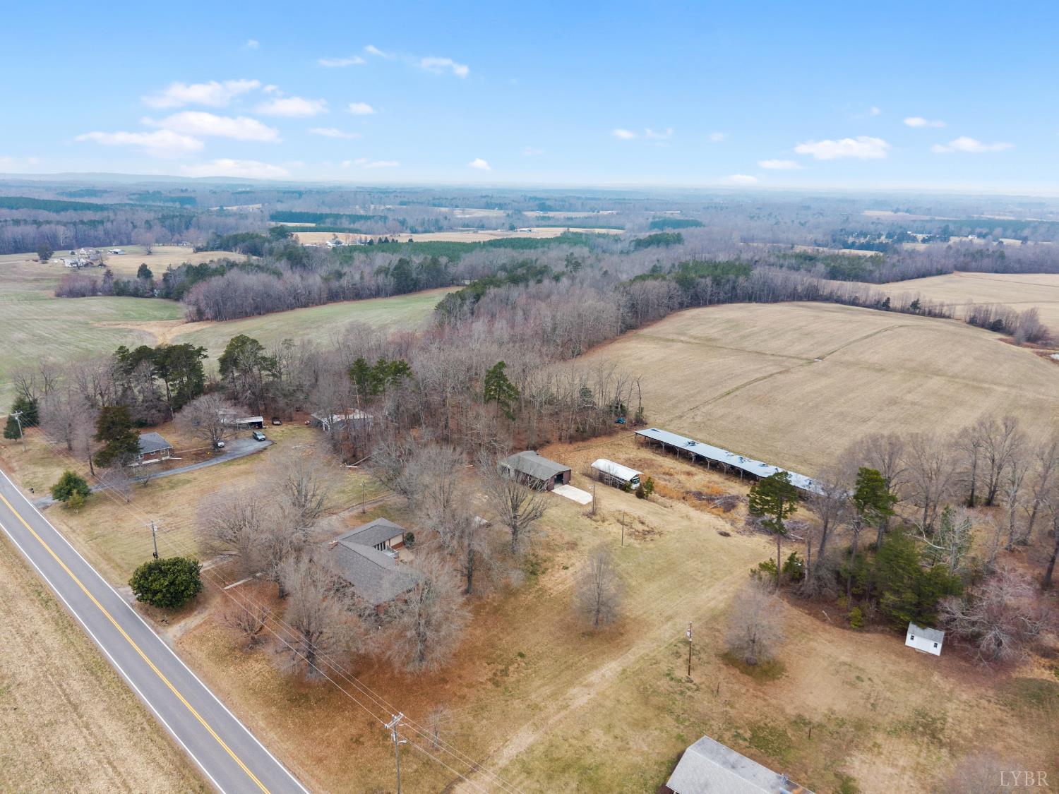 7092 Stage Coach Road Nathalie, VA 24577 - Photo 41 of 57 an aerial view of residential houses with outdoor space
