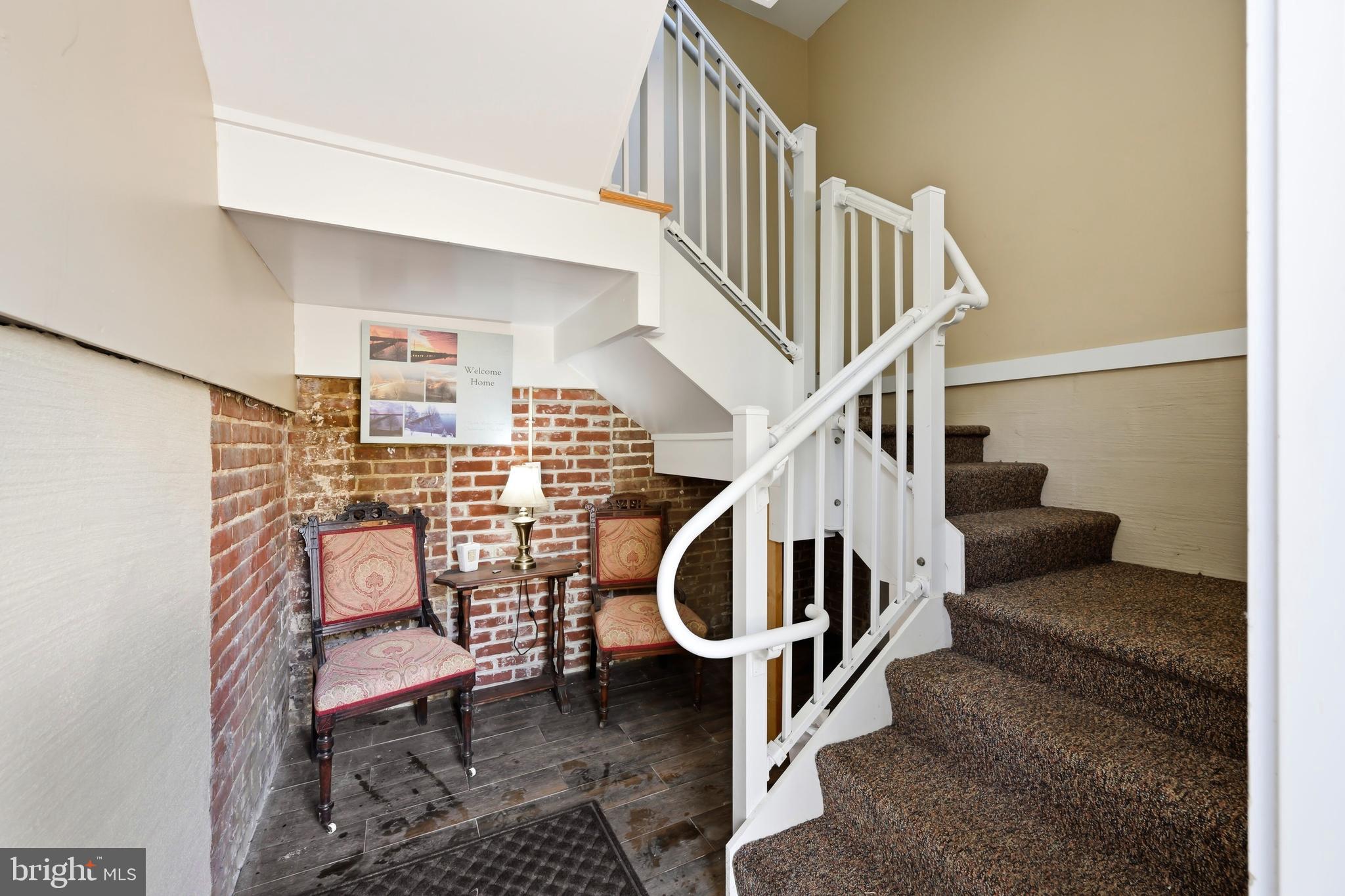 117 North Water Street, Unit 2A Chestertown, MD 21620 - Photo 13 of 24 a view of entryway and hall
