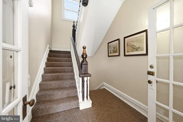 a view of an entryway with staircase