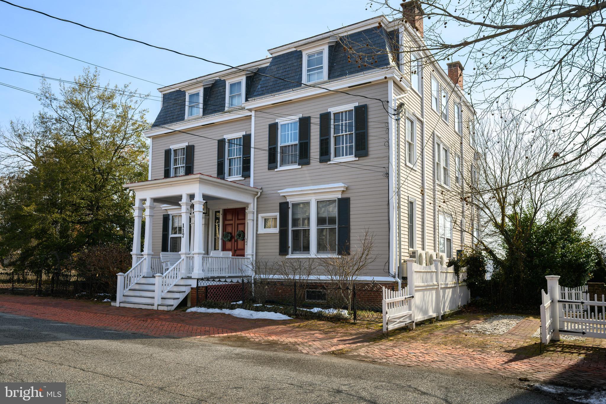 117 North Water Street, Unit 2A Chestertown, MD 21620 - Photo 3 of 24 a front view of a house with a yard