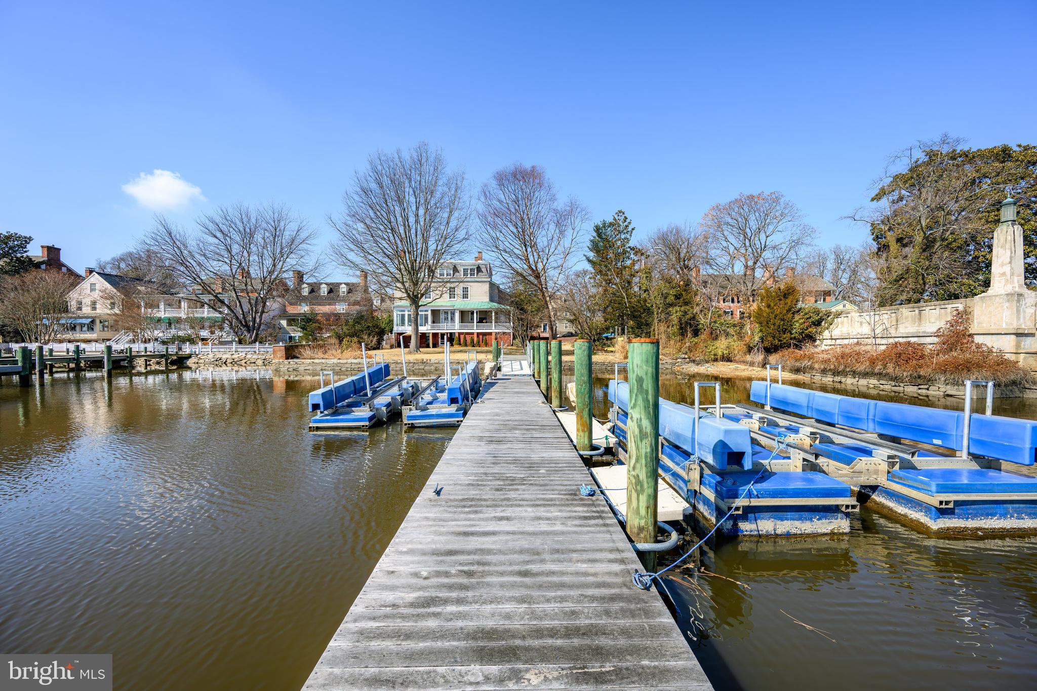 117 North Water Street, Unit 2A Chestertown, MD 21620 - Photo 7 of 24 a view of boats in a river next to a building