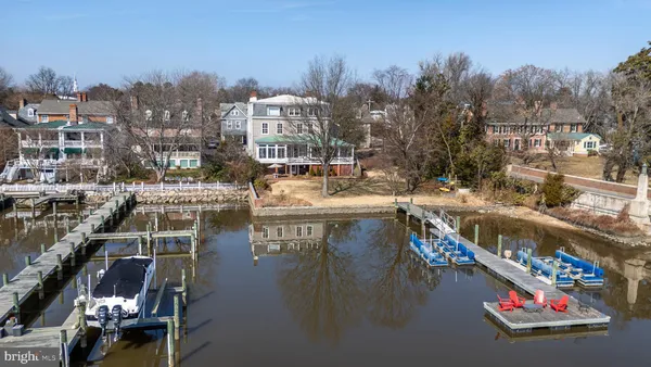 a view of yard with seating area and trees