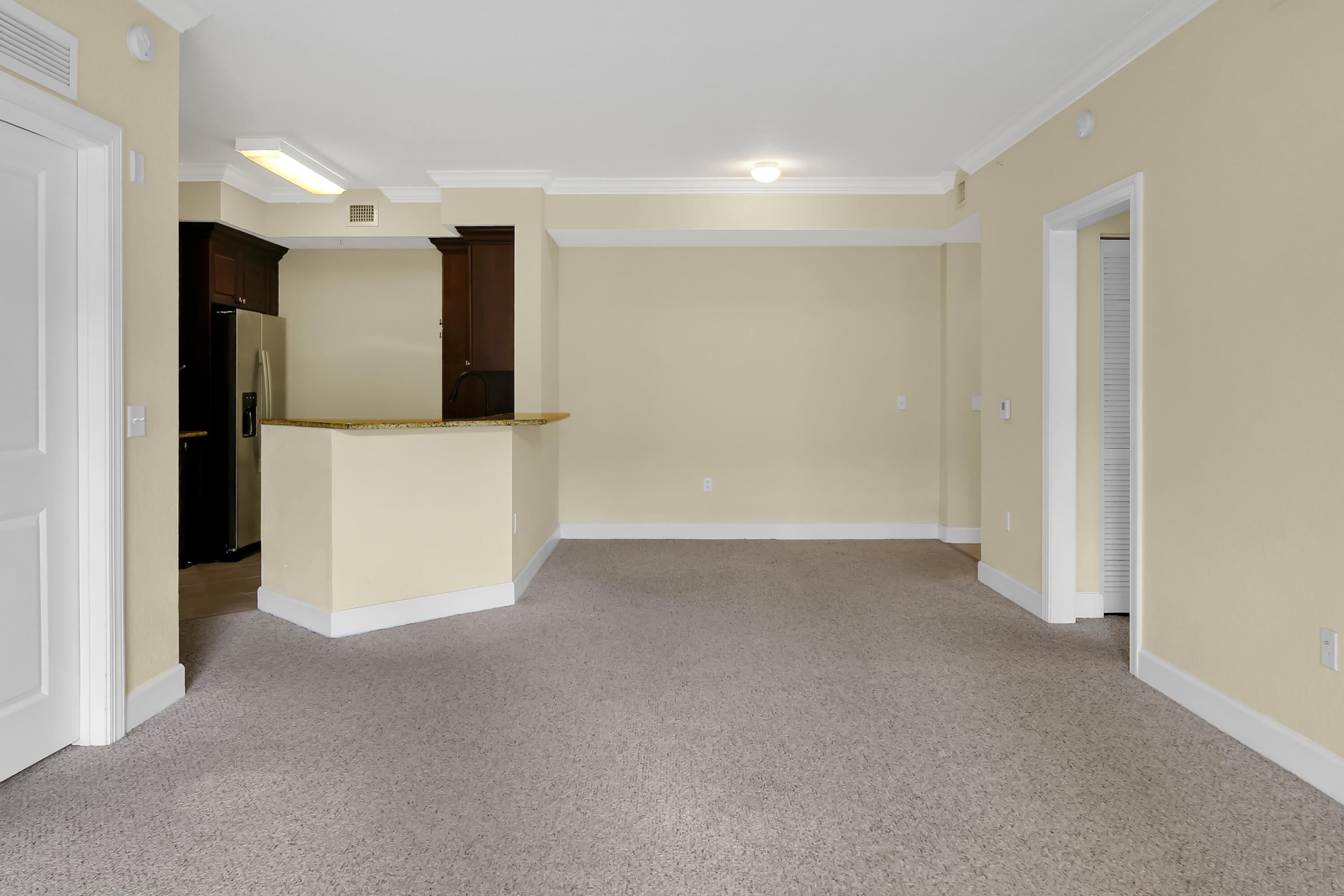 1660 Renaissance Commons Boulevard, Unit 2118 Boynton Beach, FL 33426 - Photo 13 of 24 a view of an empty room