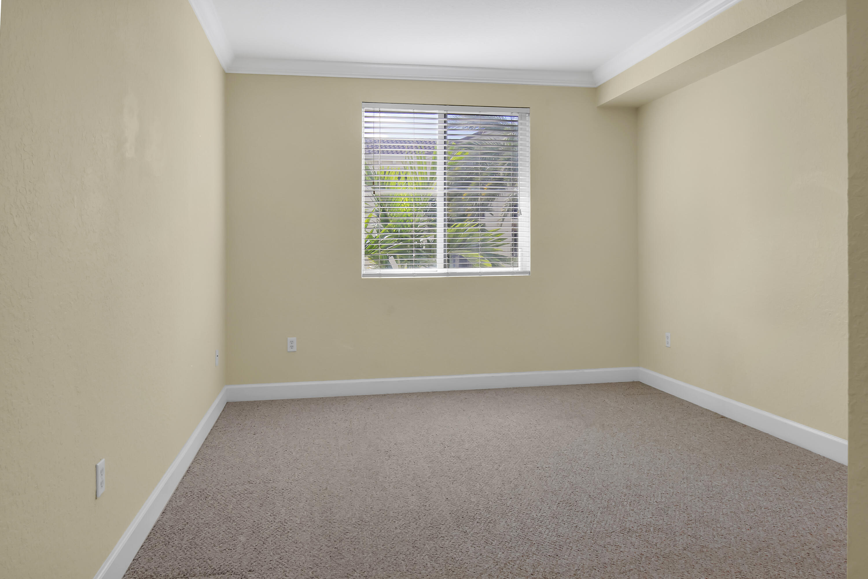 1660 Renaissance Commons Boulevard, Unit 2118 Boynton Beach, FL 33426 - Photo 16 of 24 an empty room with a window