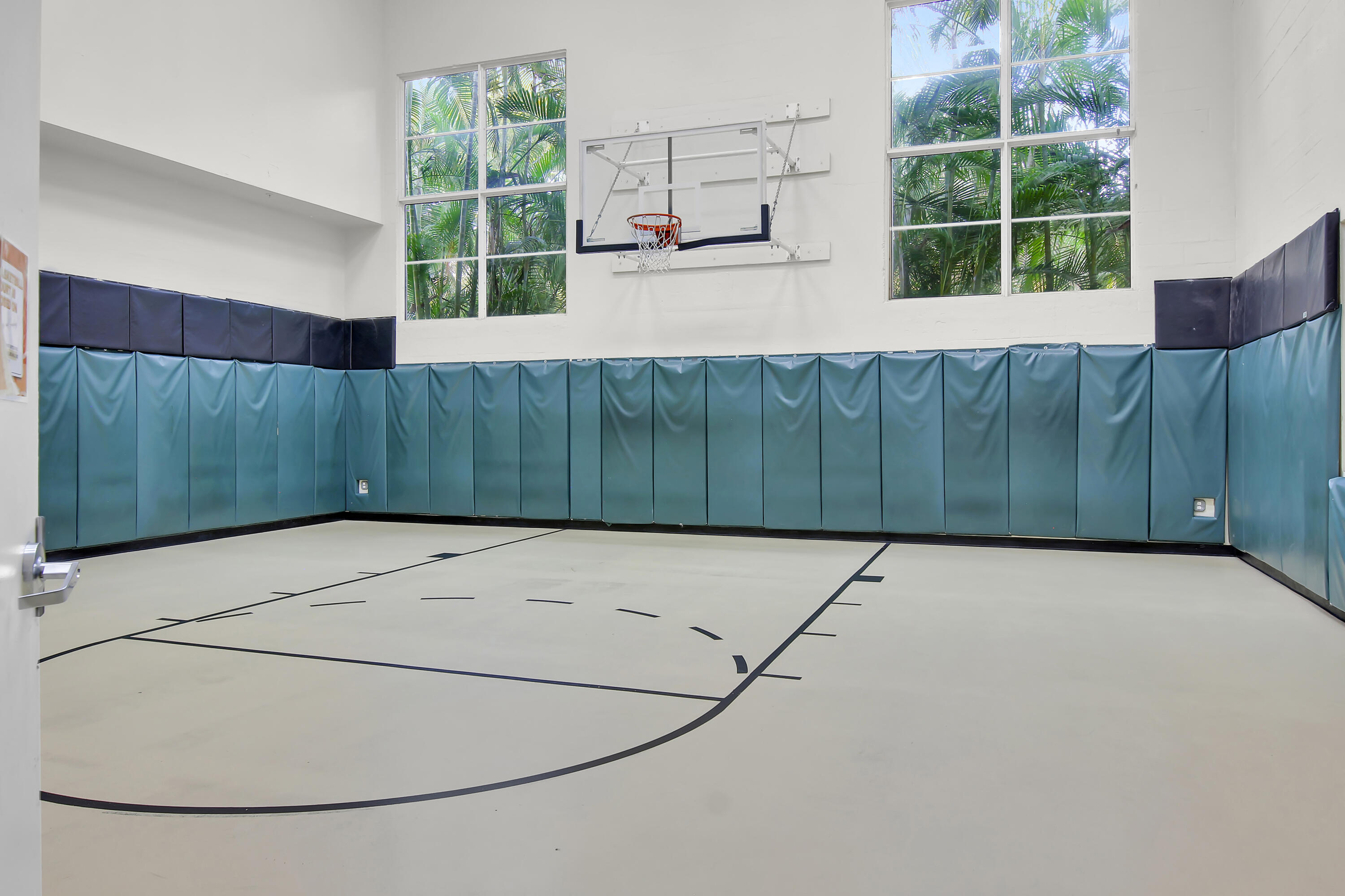 1660 Renaissance Commons Boulevard, Unit 2118 Boynton Beach, FL 33426 - Photo 2 of 24 a view of a kitchen with a window and a refrigerator