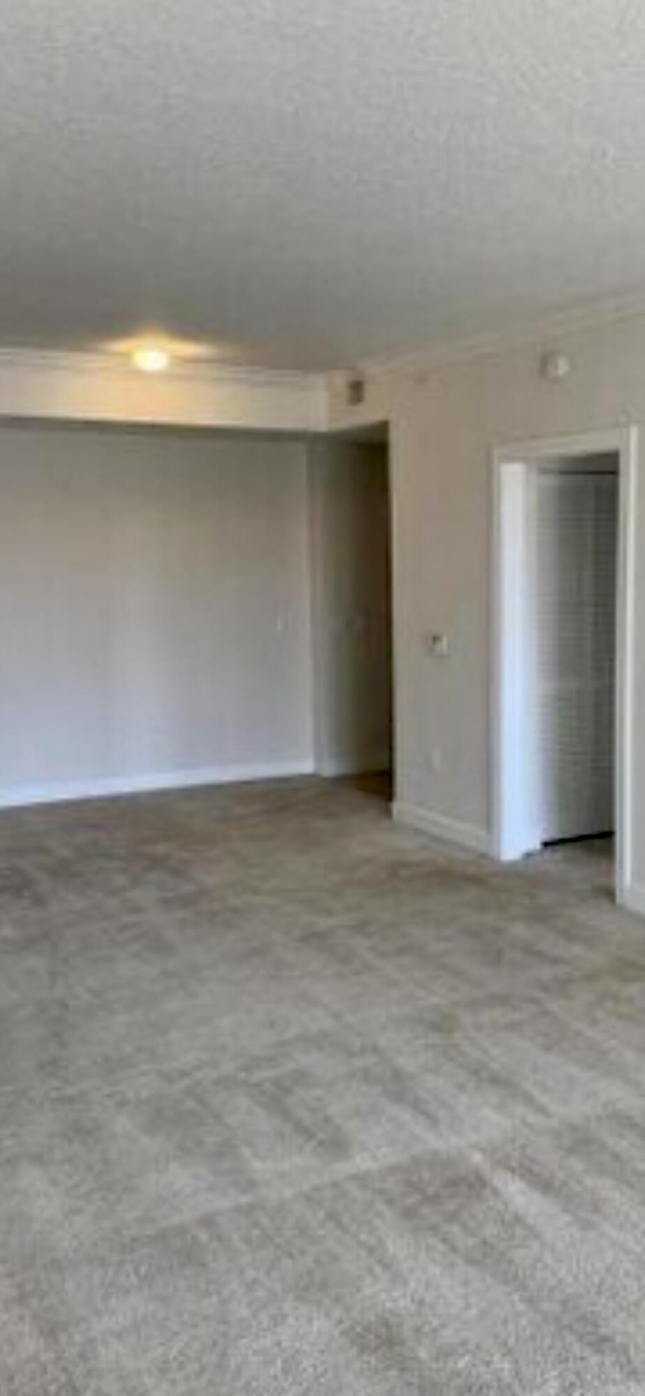 1660 Renaissance Commons Boulevard, Unit 2118 Boynton Beach, FL 33426 - Photo 8 of 24 a view of an empty room
