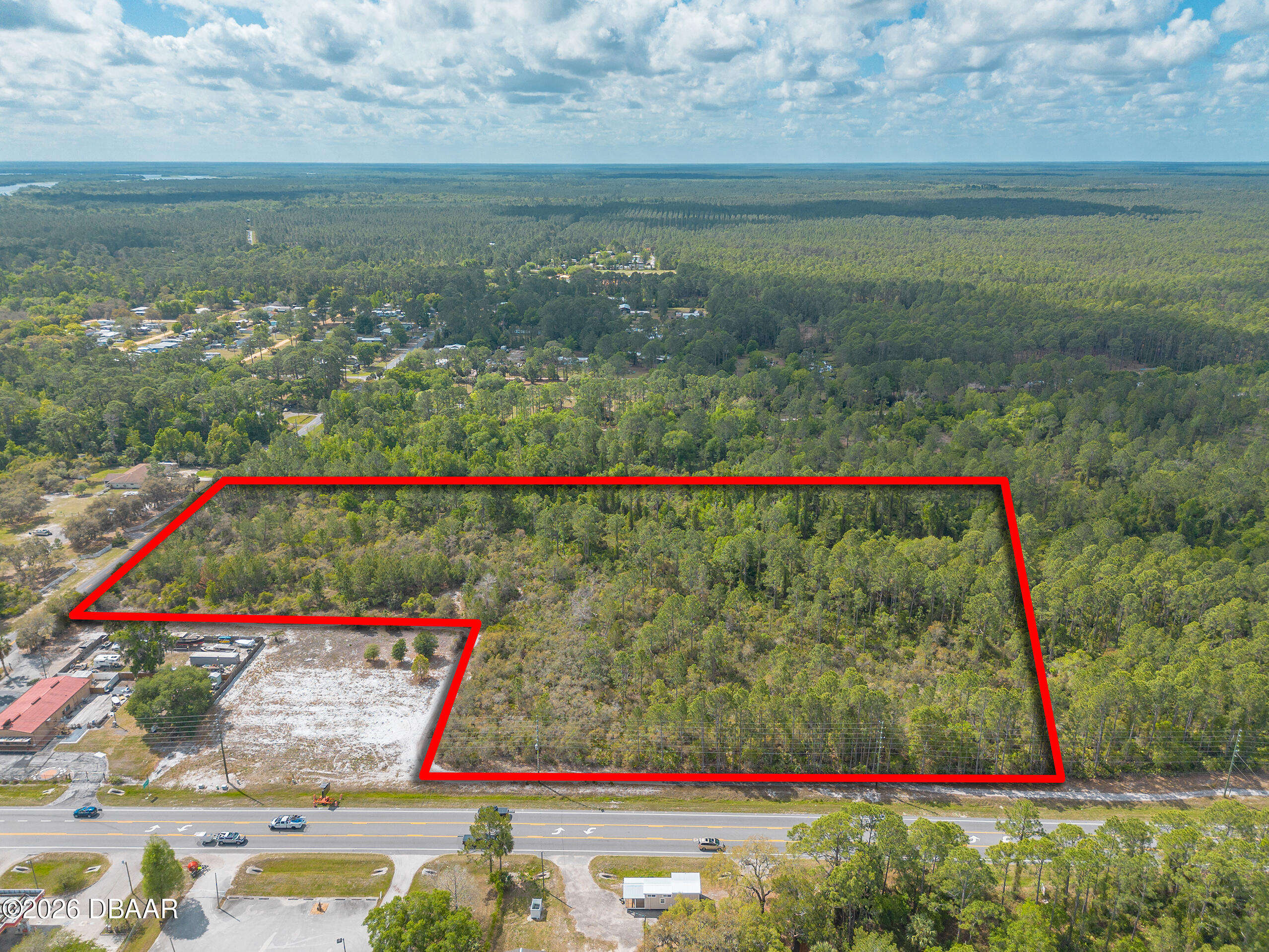 40 Alco Road Astor, FL 32102 - Photo 1 of 13 a view of a outdoor space and a yard