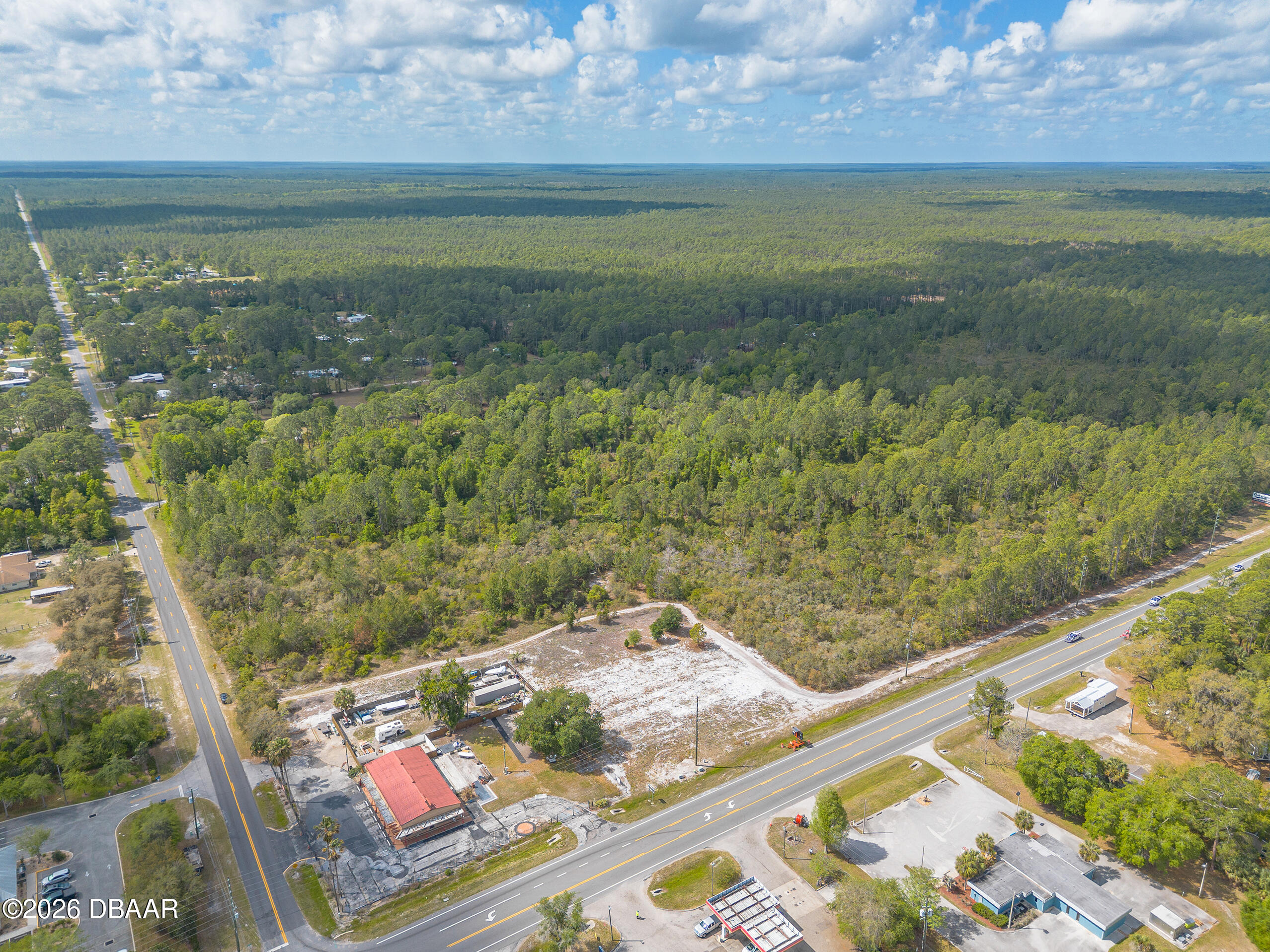 40 Alco Road Astor, FL 32102 - Photo 12 of 13 a view of a lake from a yard