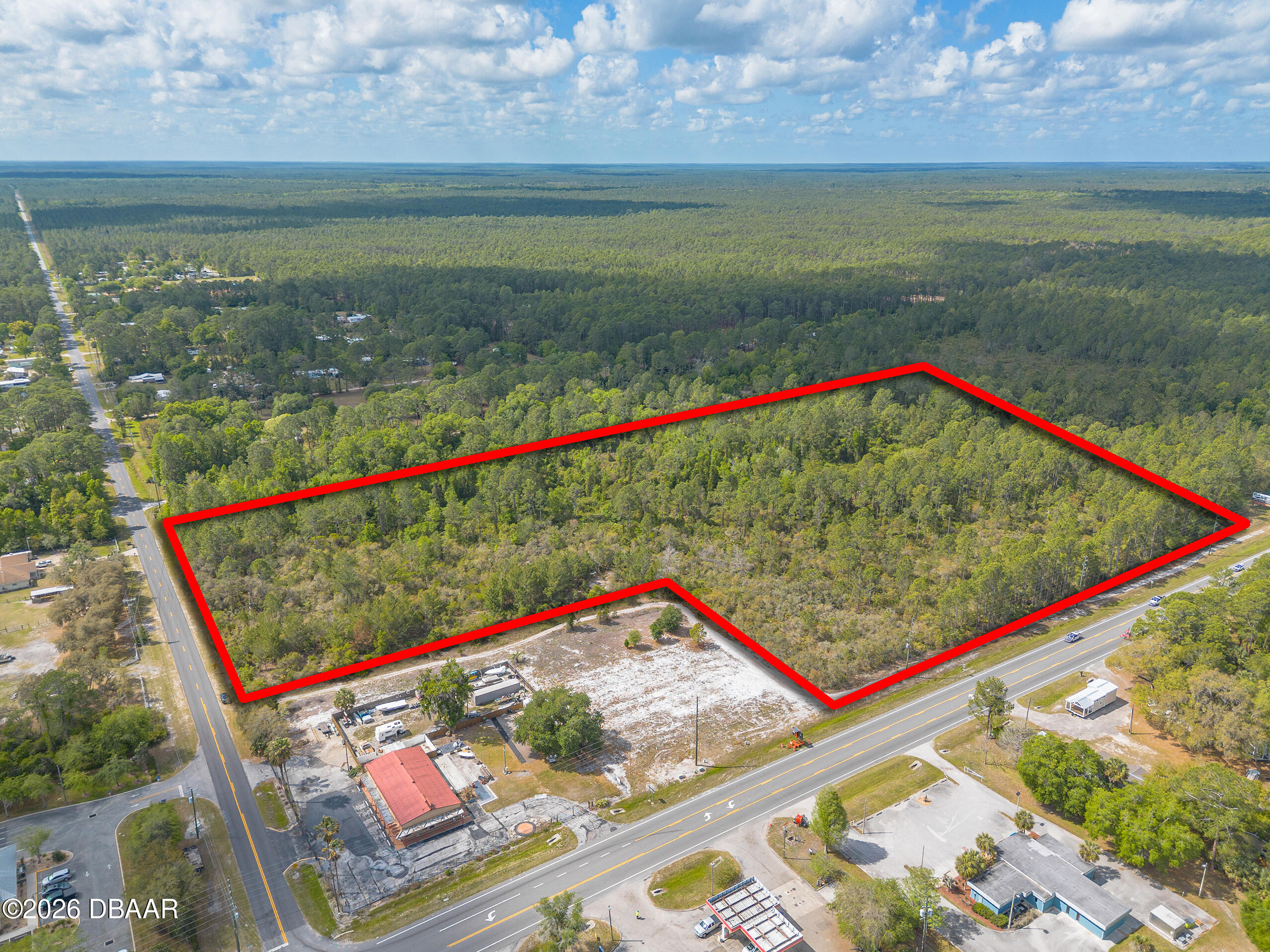 40 Alco Road Astor, FL 32102 - Photo 3 of 13 a wooden floor with a lake view