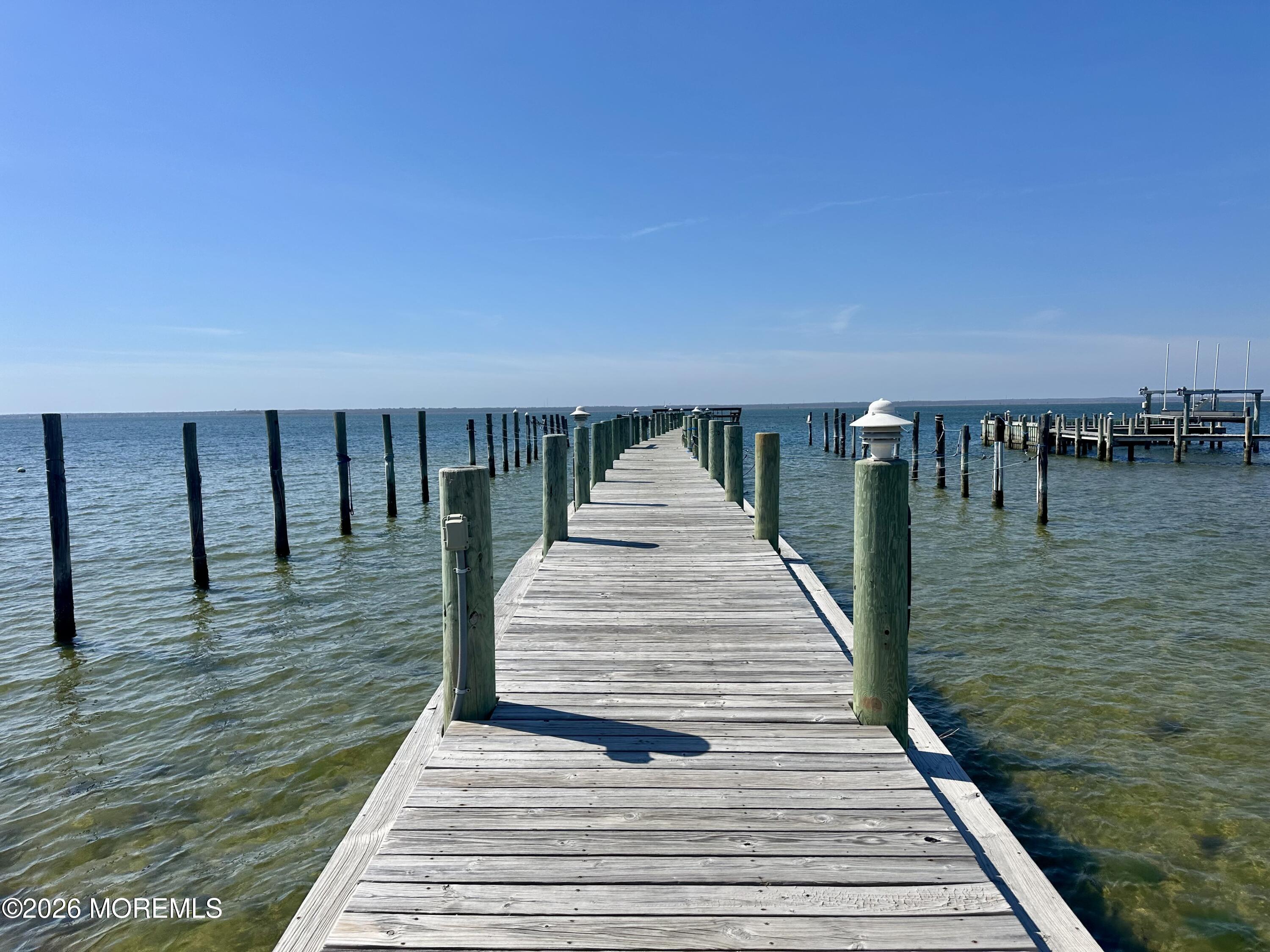 5 Windward Road Beach Haven, NJ 08008 - Photo 4 of 76 a view of wooden floor with a lake