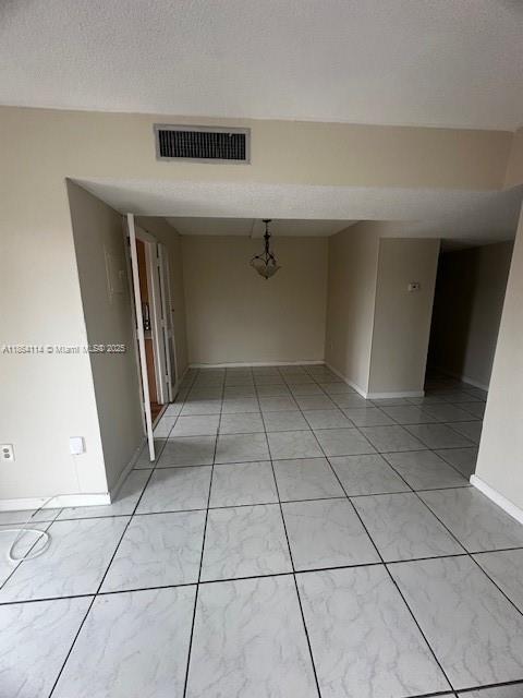 4160 Inverrary Drive, Unit 401 Lauderhill, FL 33319 - Photo 14 of 23 a view of a livingroom with an empty space and a window