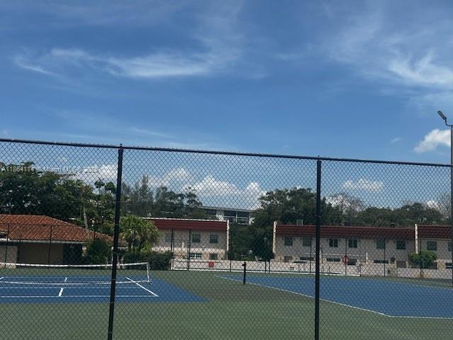 4160 Inverrary Drive, Unit 401 Lauderhill, FL 33319 - Photo 3 of 23 a outdoor space with lots of palm trees