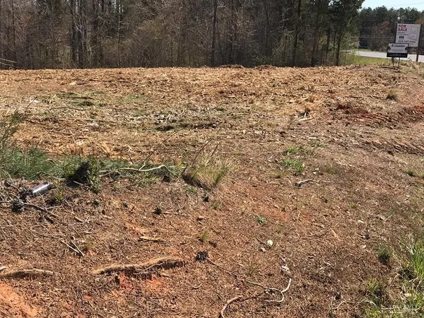a wooden bench with fog