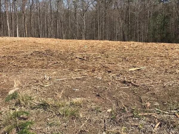 a swimming pool with wooden fence