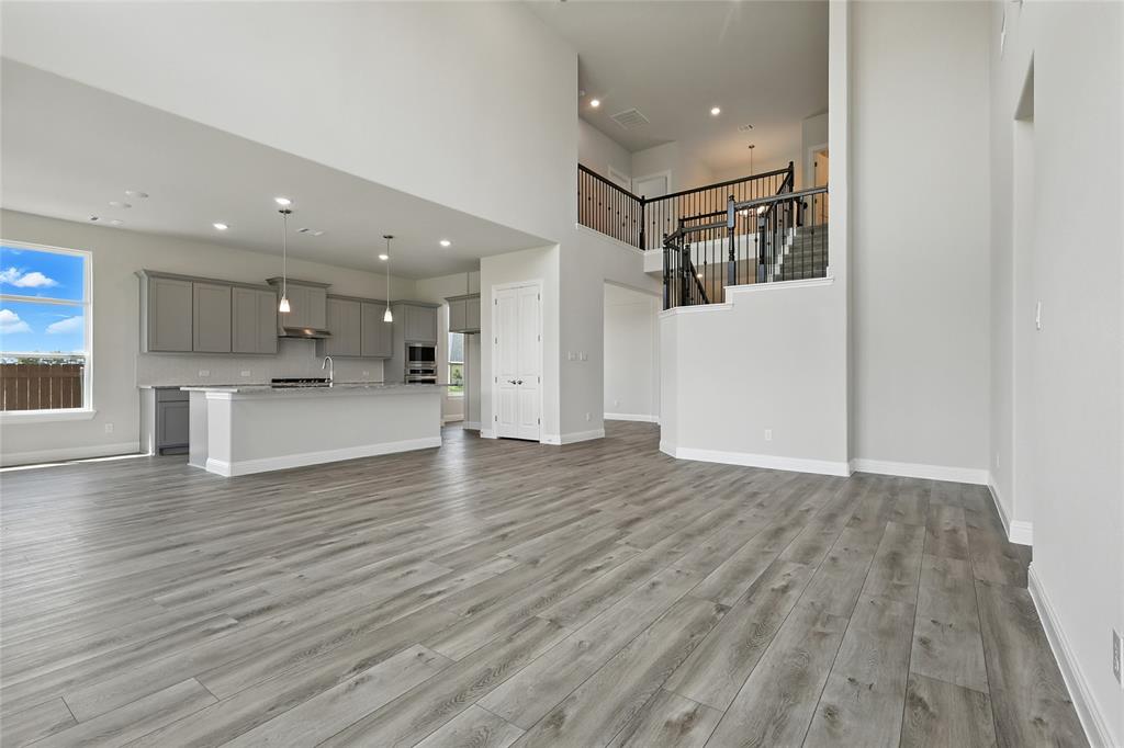 560 Flint Road Waxahachie, TX 75167 - Photo 12 of 40 a view of kitchen with cabinets and wooden floor