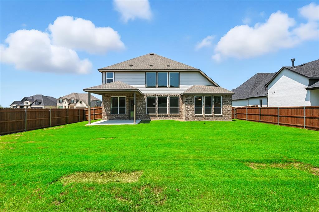 560 Flint Road Waxahachie, TX 75167 - Photo 33 of 40 a front view of a house with a garden