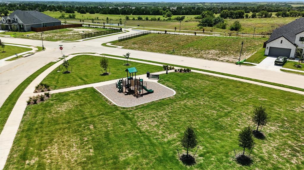 560 Flint Road Waxahachie, TX 75167 - Photo 37 of 40 a view of a backyard with outdoor space
