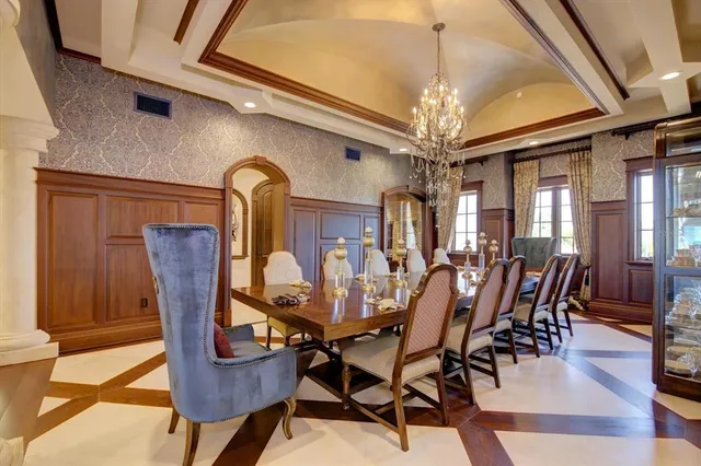 a view of a swimming pool with a table and chairs