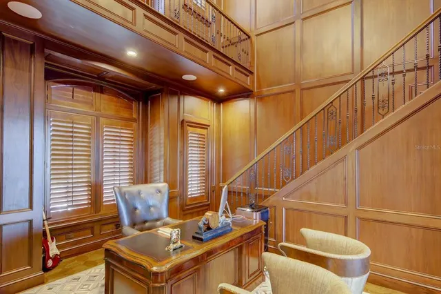 a view of a living room and kitchen