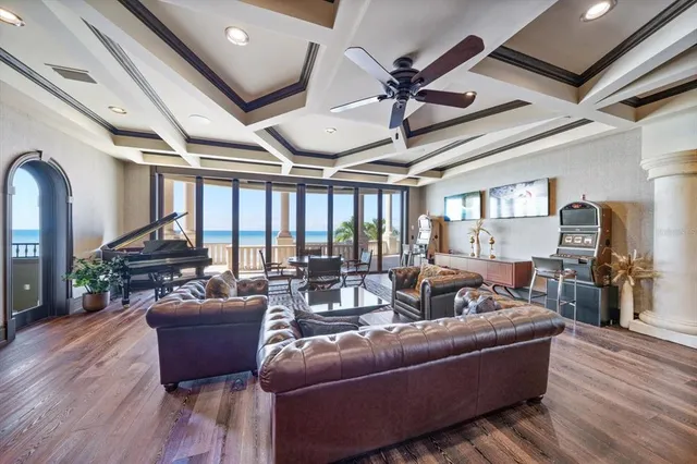 a view of a swimming pool with an outdoor seating space