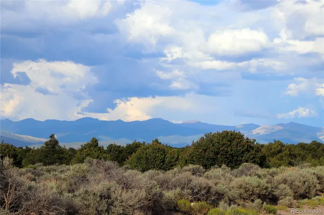 a view of mountain and a mountain
