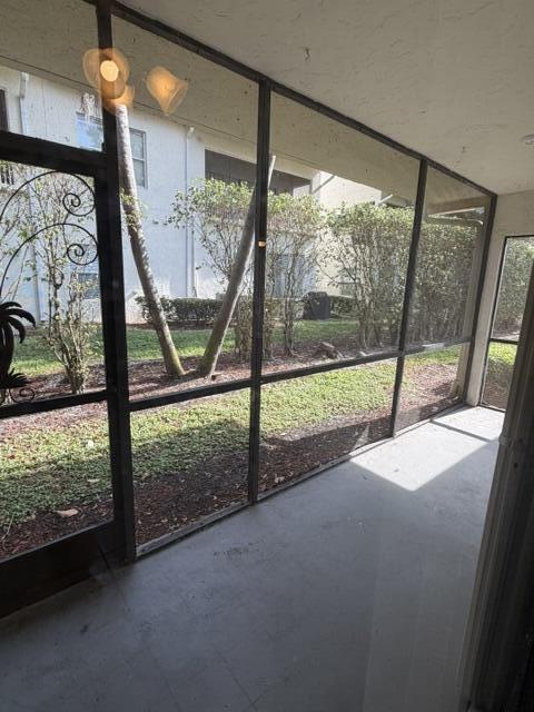 12628 Shoreline Drive, Unit 9C Wellington, FL 33414 - Photo 30 of 32 a view of outdoor space with porch