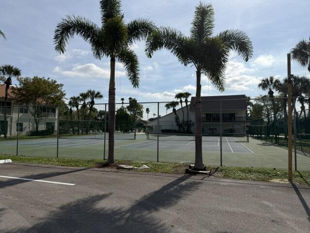 12628 Shoreline Drive, Unit 9C Wellington, FL 33414 - Photo 31 of 32 a view of a park with palm tree